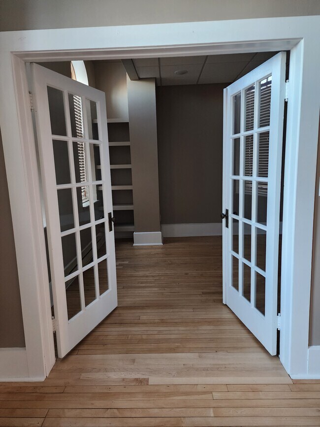Beautiful french doors to bedroom. - 604 Main Ave