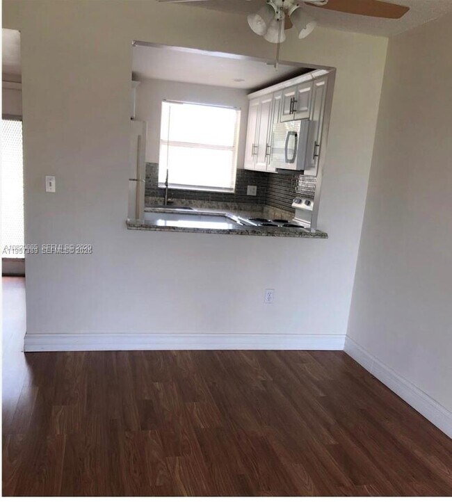 Building Photo - 8590 Sunrise Lakes Blvd