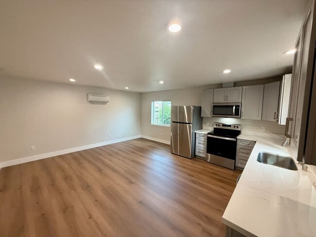 Building Photo - NEW BUILD! Beautifully designed mini home with Solar!!