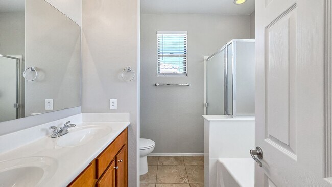 Building Photo - Enjoy the incredible amenities at Estrella Mountain Ranch!