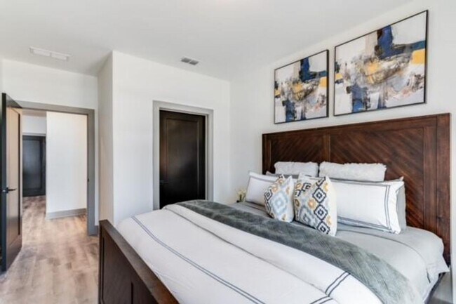 Building Photo - Modern Living Meets Walkable City Charm in...