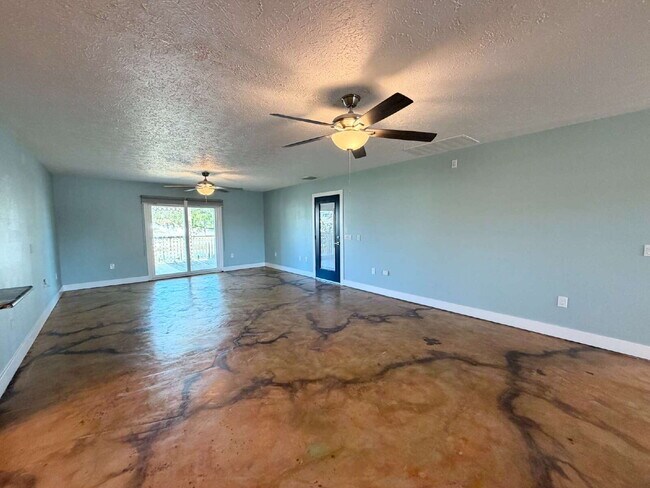 Building Photo - "Waterfront Home with Dock! 3-Bedroom Oasis with 2 Baths and 1,800 Sq Ft of Comfort in Hudson, FL!"