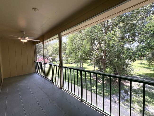 Building Photo - Beautiful Corner Unit with Vinyl Plank Flooring & Private Screened Patio
