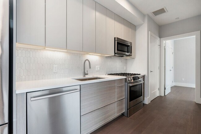 Building Photo - Jamaica Plain spacious studio w/ central a...