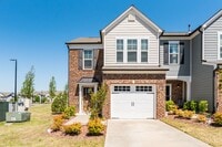 Building Photo - End unit townhome loaded with upgrades close to RTP! Available: Now