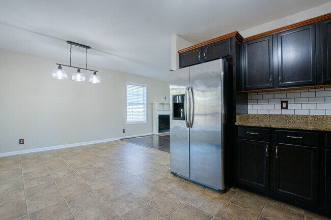Building Photo - Pet Friendly Three Bedroom with Bonus!