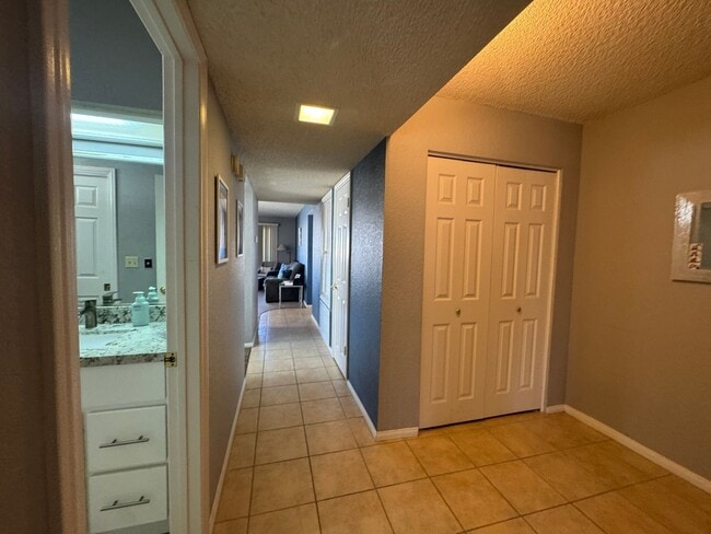 Building Photo - FURNISHED 2BR CONDO w/Utilities Water View Gated NO STAIRS