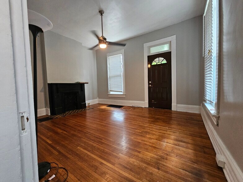 Look from the bottom staircase that seperates kitchen from living room - 943 Highland St