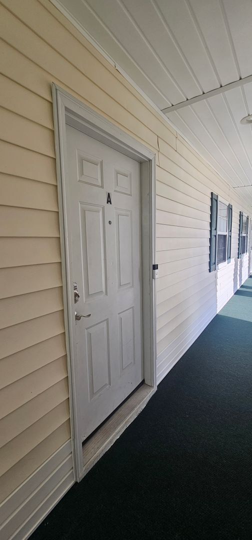 Building Photo - -First-Floor End-Unit | Fully Furnished 2B...