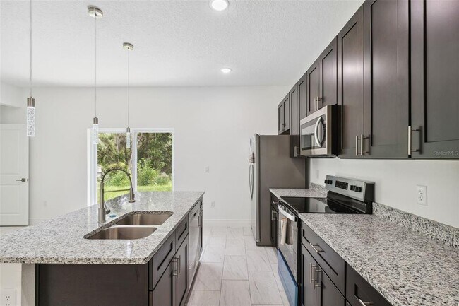 Building Photo - 10089 N Athenia Dr
