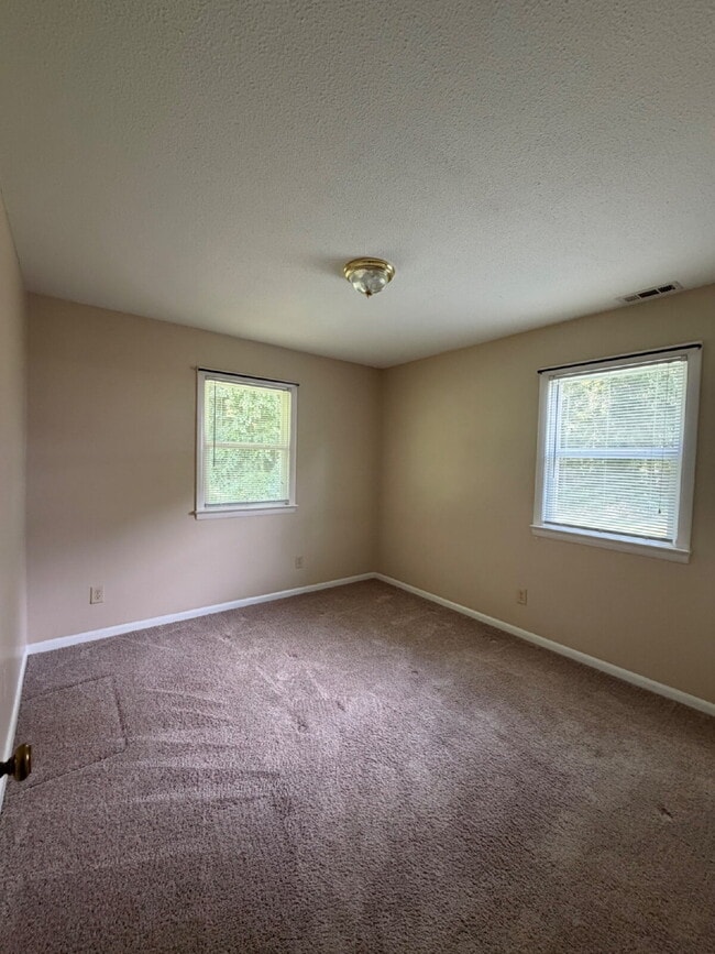 Building Photo - Immaculate 2 BR | 1 BA Apartment in Goldsboro *Water/Trash/Lawn Care Included!* Scott Hills Apts