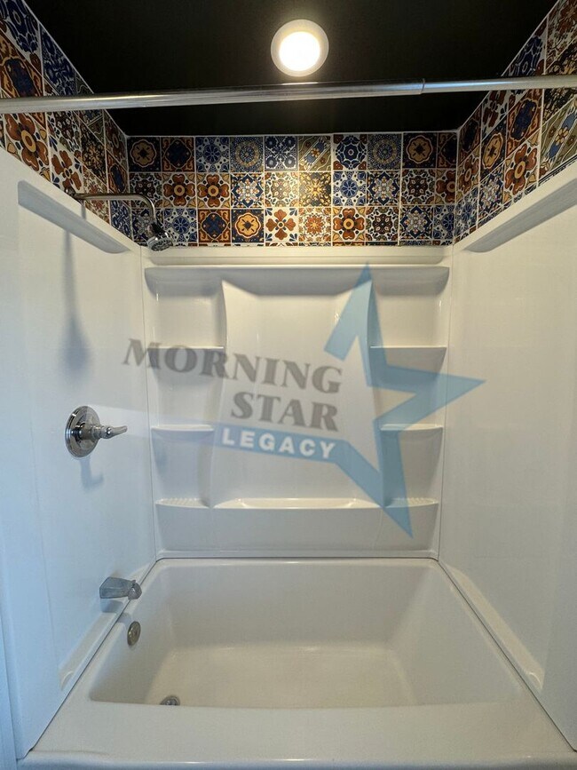 Building Photo - Charming Updated Home w/ Enclosed Yard & Storage