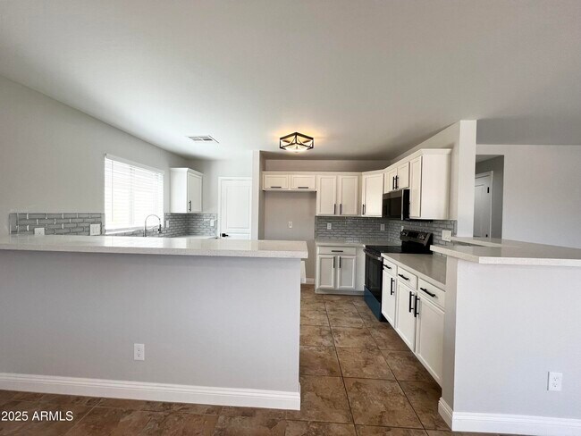 Building Photo - 37061 W Bello Ln