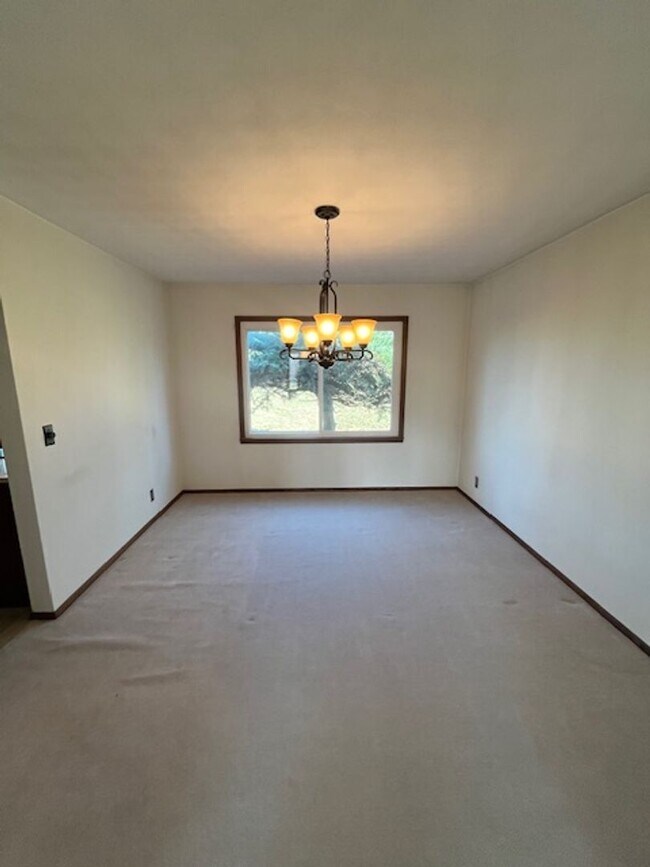 Building Photo - Spacious, Fully Updated Home with Walkout Basement on a Mature Lot