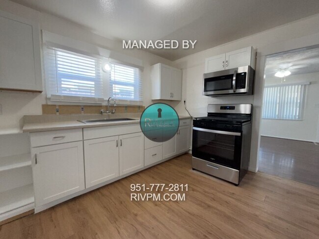 Building Photo - WELCOME TO YOUR NEW HOME IN THE WOOD STREE...