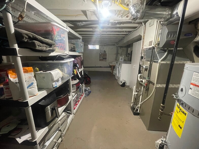 Downstairs utilities and storage - 824 N Killingsworth Ct