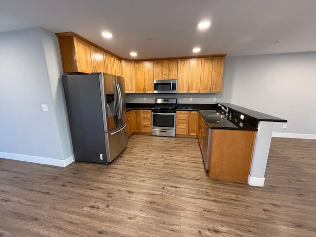 Building Photo - NEW PHOTOS! Two-level home located in Coff...