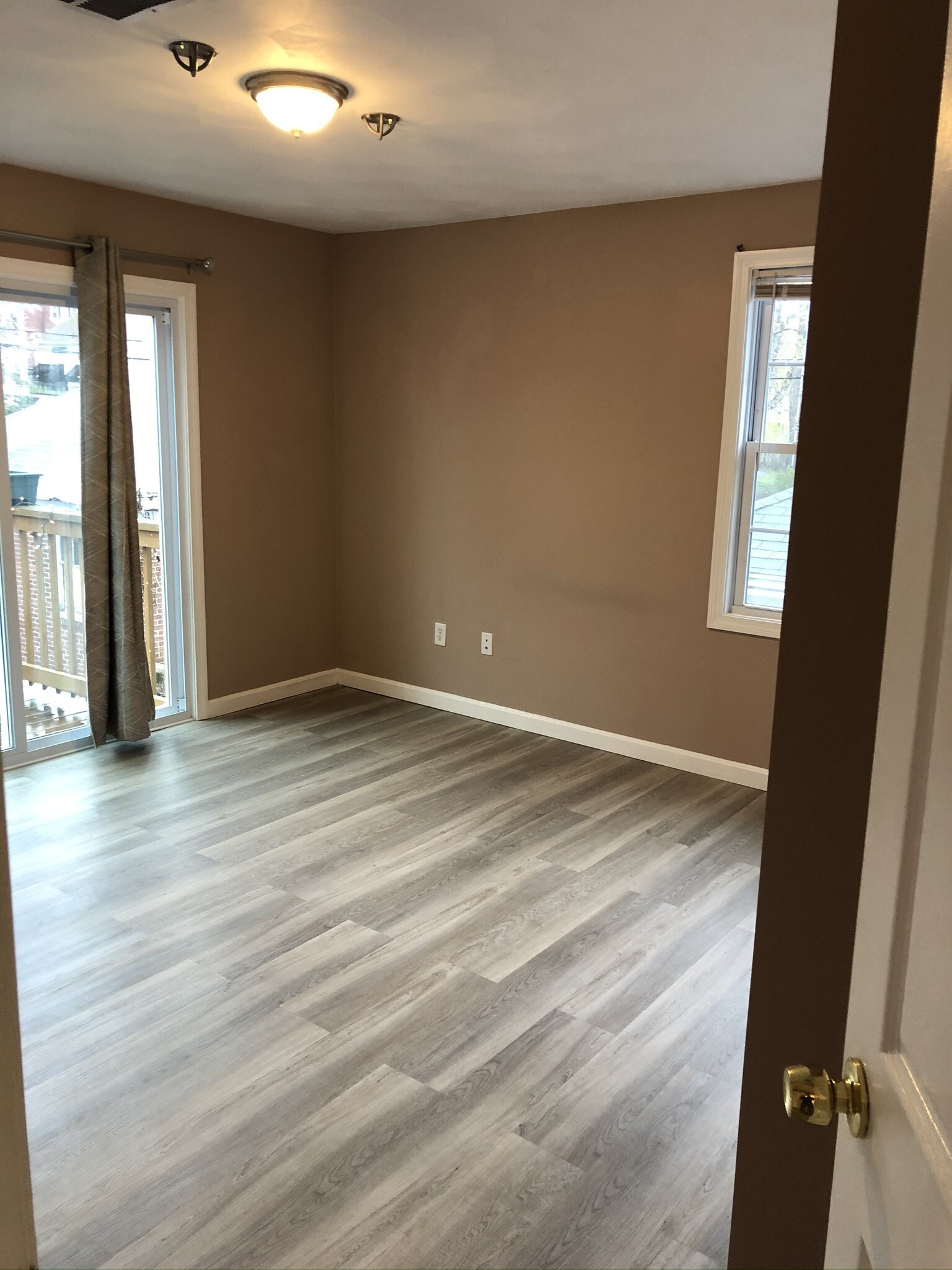 Bedroom 1 with deck access and closet - 907 Smith St
