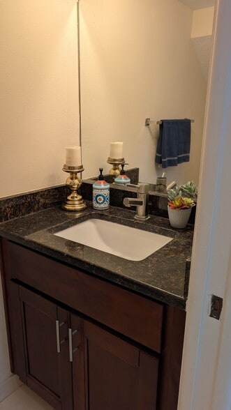 Half bathroom on first floor - 6909 Lake Place Ct