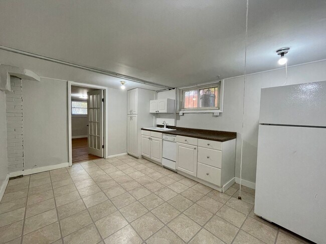 Building Photo - $0 DEPOSIT OPTION, NEW PAINT, TRADITIONAL BRICK HOME, WALKING DISTANCE TO DU!! LARGE BACKYARD, DE...