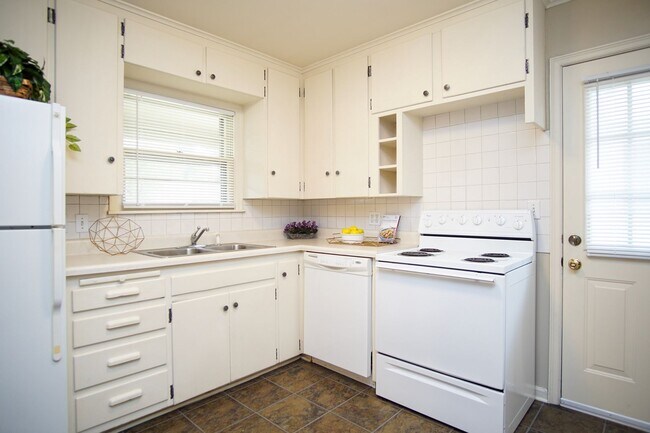 Building Photo - Gorgeous duplex unit on large lot with garage -- NO PETS ALLOWED