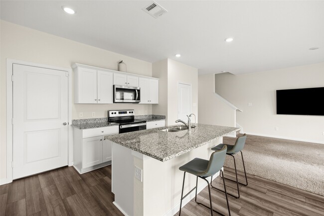 Building Photo - 7810 Pink Dahlia Dr