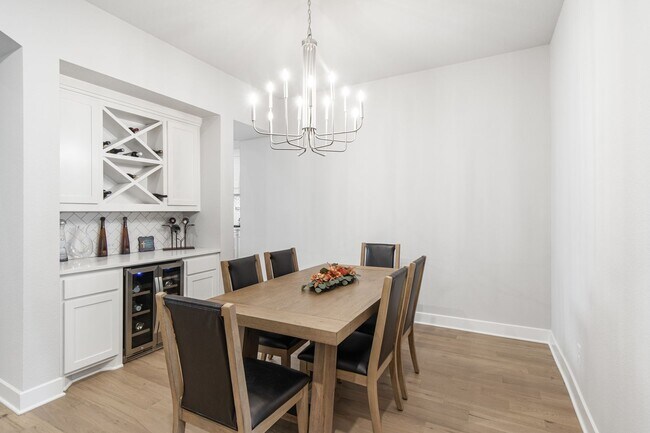 Building Photo - Stunning 4-Bedroom Luxury Residence with Bonus Office in the Prestigious Walsh Community LIKE NEW!