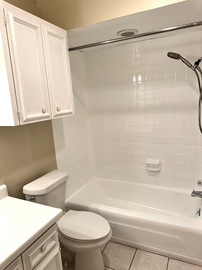 Building Photo - Single-level living on ground floor  |  Fresh paint (July 2026)  |  2 carports  |  Community Pool...