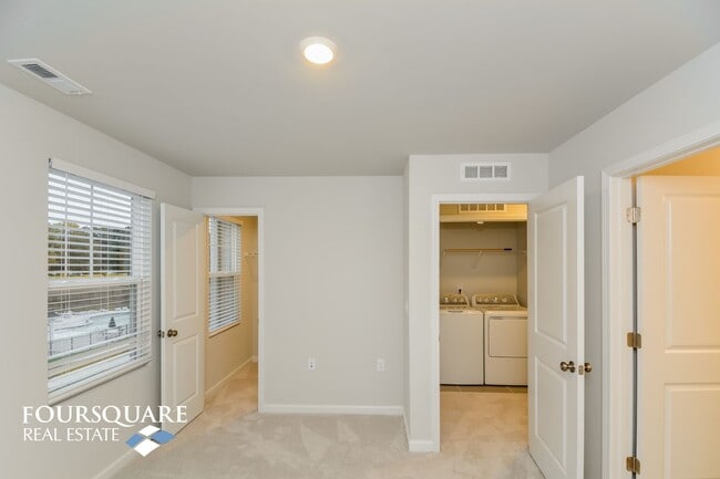 Building Photo - Modern 3-Story Townhome with First-Level B...