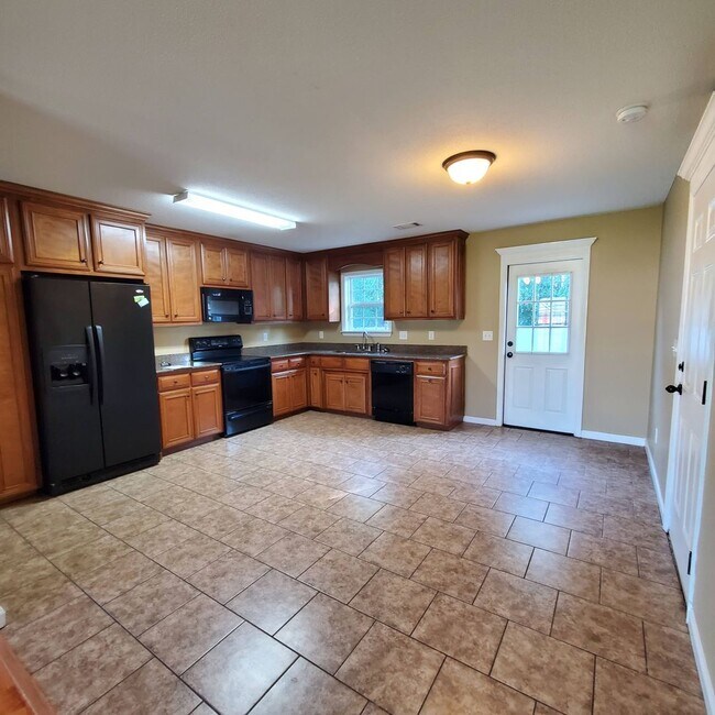 Building Photo - Welcome to Serene Living: Spacious Home on a .61 Acre Lot near Moody Airforce Base