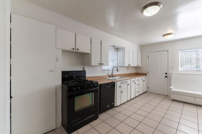 Building Photo - Historic Neighborhood + Utilities Included | 3BR with Backyard Oasis and Detached casita