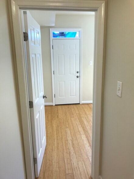 Entry to larger bedroom/door to balcony - 1448 Newton St NW