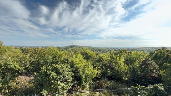 Building Photo - Welcome home to breathtaking views in this...