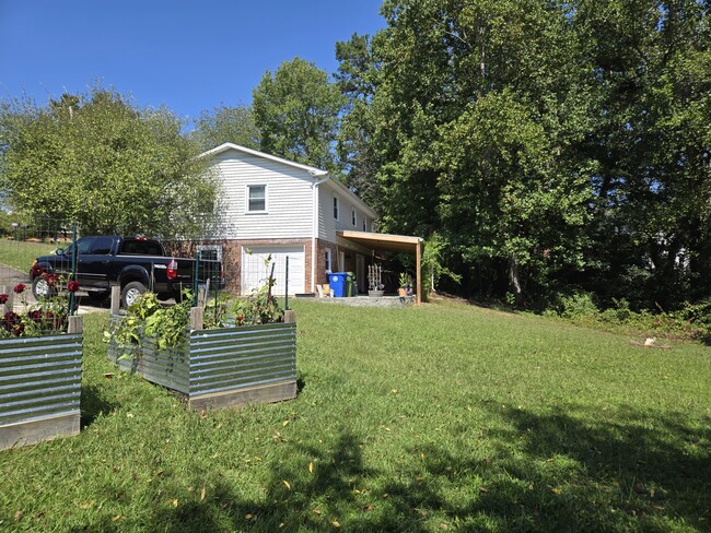 Raised garden beds for your use - 15 Kirby Pl