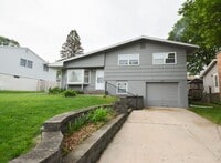 Building Photo - Beautiful multi-level with Gorgeous Yard and LOTS of Storage!