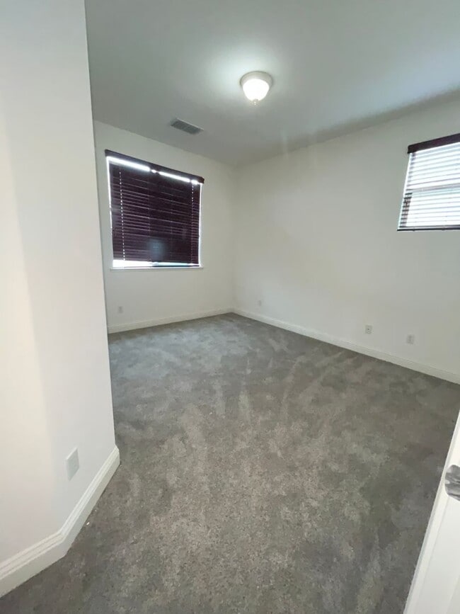 Building Photo - Exceptional 4BR/3BA/3 Car Tandem Garage in...