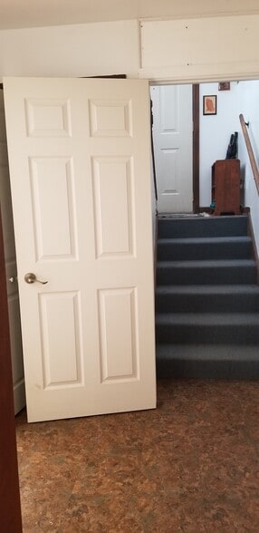 Door to downstairs apartment open - 2116 Thaler Ave