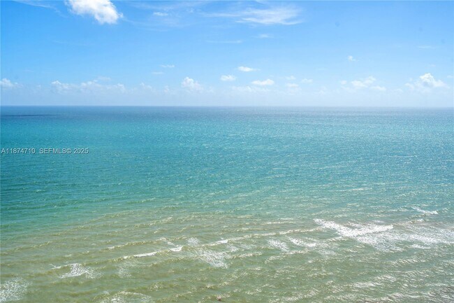 Building Photo - 15811 Collins Ave