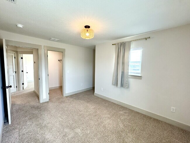 Building Photo - Need Space?  How about 5 bedrooms, 2.5 baths + an extra bonus area upstairs so that the kids can ...