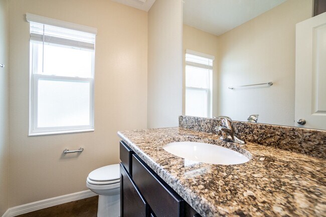 Building Photo - MOVE IN SPECIAL- Beautiful 3/2 Energy Effi...