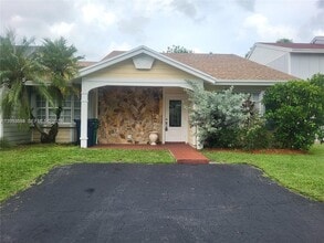 Building Photo - 14419 SW 142nd Ct
