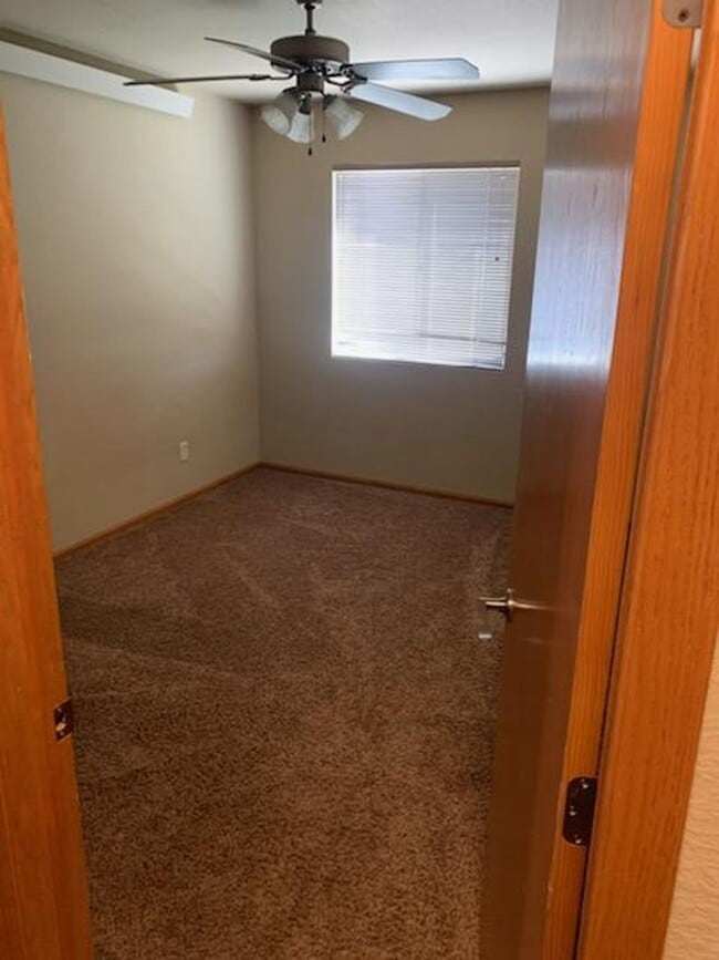 Building Photo - $1700 - 3 Bedroom, 2 Bathroom Townhome - Garage and Large Yard!