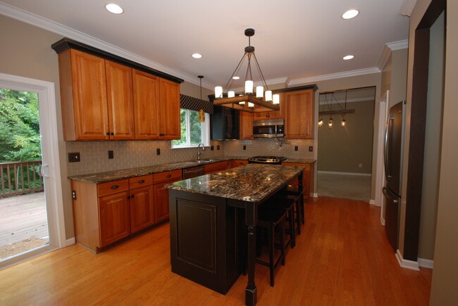 Building Photo - Oversized Executive Style Home with Finished Basement in Desirable Providence Neighborhood!