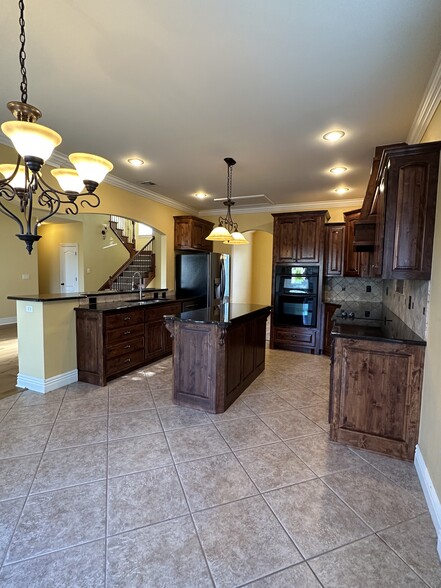 Kitchen with appliances - 6435 W Bridge Bay Dr