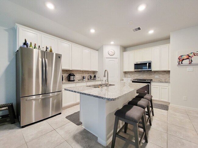 Building Photo - BEAUTIFUL 3 BEDROOM 2 BATH HOME WITH NO BACKYARD NEIGHBORS. TALL TREES AS YOU LOOK FROM THE COVER...