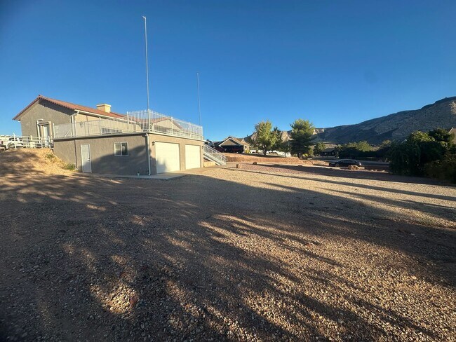 Building Photo - Quiet neighborhood, 3 bedroom, 2 bath home, huge front patio/deck, RV parking!