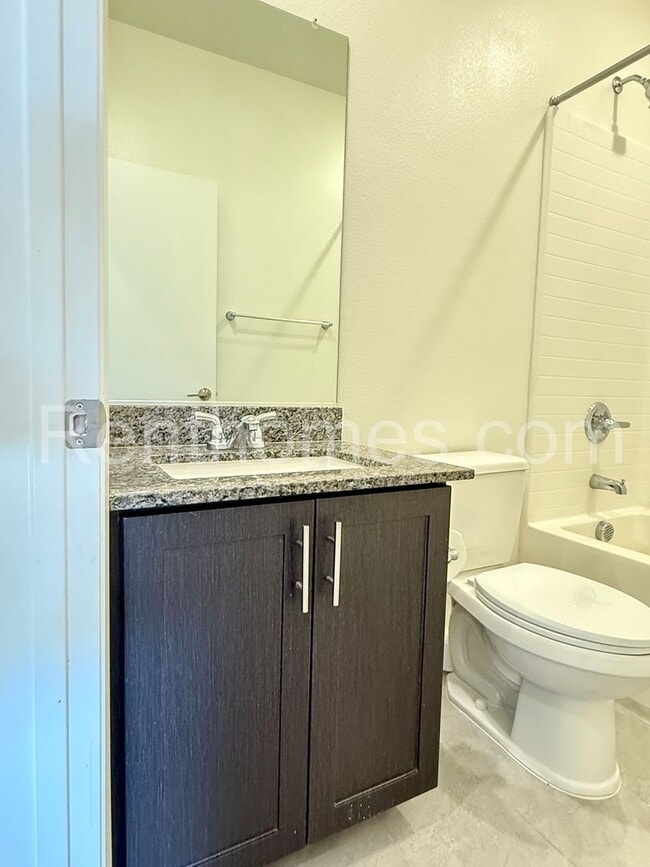 Building Photo - Otay Mesa, 5841 Seacliff Pl #95, LVP Flooring, Quartz Counters, 8 Solar Panels, AC, 2 Car Garage.