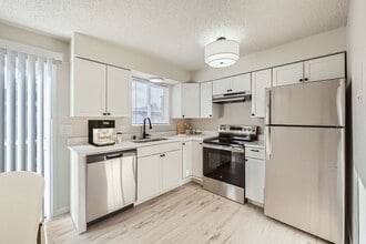 Building Photo - Breathtaking Renovation! Oversized 2 Bed 1.5 Bath Townhome! Ready Now! Don't Miss Out!