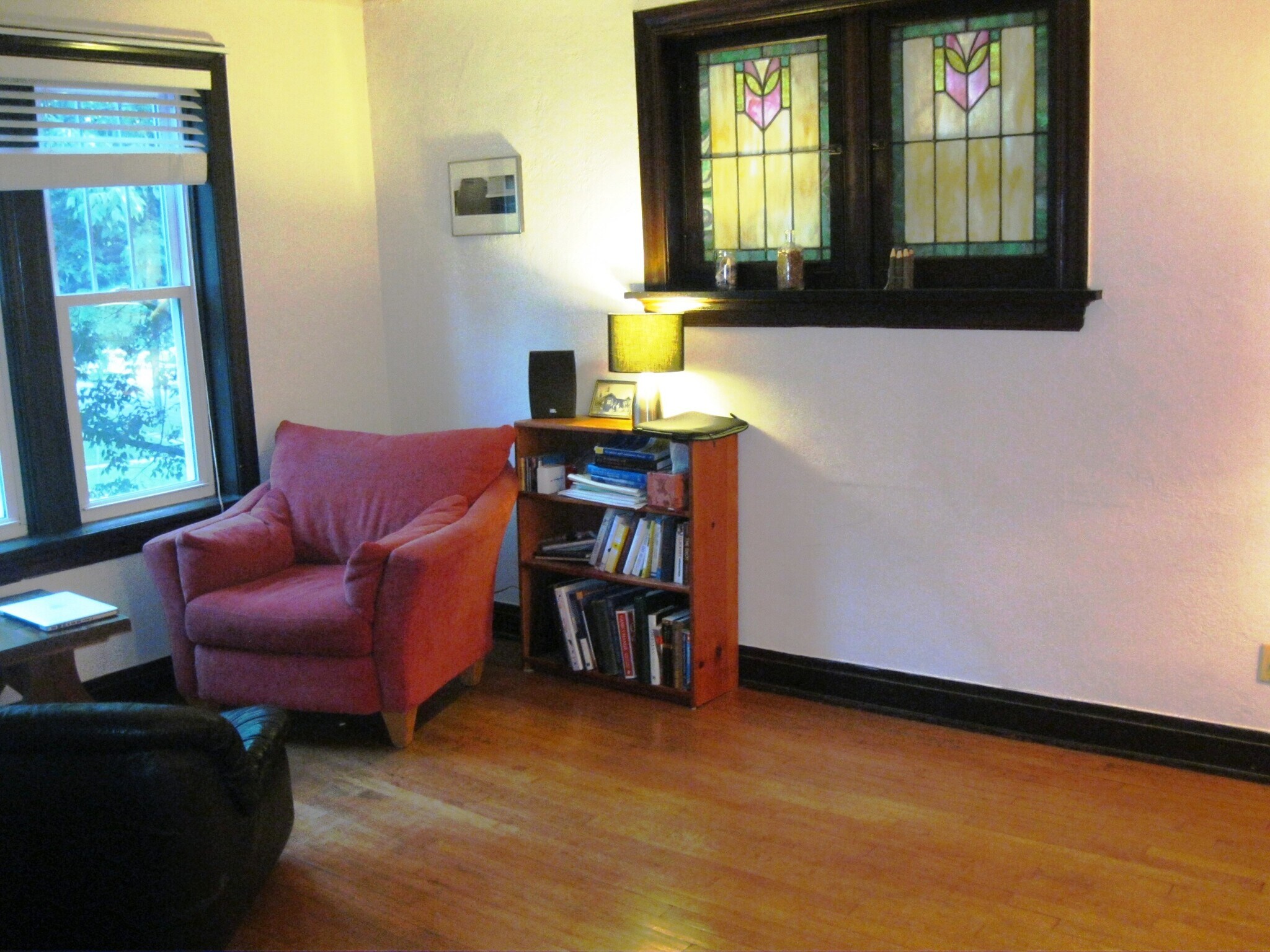 Stained Glass windows in Sun Room give amazing light with the afternoon sun. - 6633 Alamo Avenue