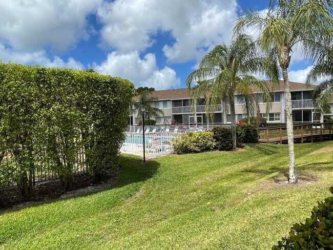 Building Photo - ANNUAL RENTAL - 3 BED / 2 BATH WITH CARPOR...